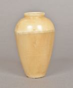 An Egyptian alabaster jar Of plain ovoid form. 14.5 cm high.