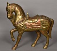 A near Eastern brass and copper clad horse, possibly Trojan 61 cm high.