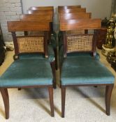 A set of eight early 19th century mahogany line inlaid dining chairs Each with curved centre panel,