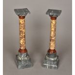 A pair of specimen marble columns Each 39.5 cm high.