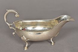 A George III silver sauce boat, hallmarked London 1785,