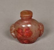 Two Chinese carved hardstone snuff bottles and stoppers The largest 7 cm high.