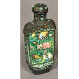 A Chinese turquoise set white metal enamel decorated snuff bottle Worked with precious objects.
