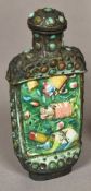 A Chinese turquoise set white metal enamel decorated snuff bottle Worked with precious objects.