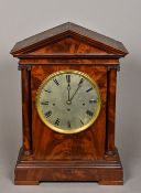 A 19th century mahogany cased bracket clock The 9" silvered dial with Roman numerals and triple