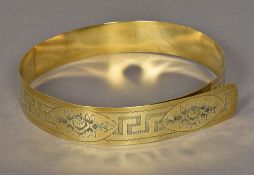 A Victorian engraved brass ladies belt Decorated in the round with floral vignettes above a Greek