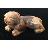 A Chinese carved hardstone lion 4.5 cm long.