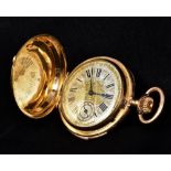 An 18 ct gold cased repeating full hunter pocket watch The engraved silvered dial with Roman and