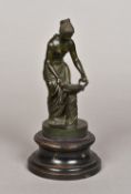 A Grand Tour patinated bronze model of a semi-clad female figure Modelled collecting water from a