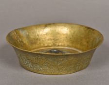 A 19th century Persian bronze magic bowl Of flared form, with central dome,