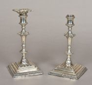 A pair of George II silver candlesticks, hallmarked London 1759,