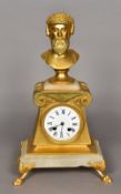 A 19th century gilt metal and alabaster mantle clock The white enamelled dial with Roman numerals