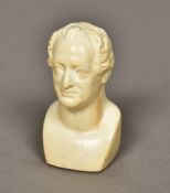 A small 19th century carved ivory bust Modelled as a distinguished gentleman. 6 cm high.