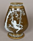 A 19th century pate-sur-pate porcelain vase Of spreading narrow ovoid form,