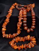 A faceted amber bead necklace The marcasite clasp stamped Sterling Silver;