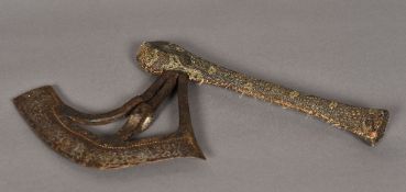 An antique tribal axe With open work blade and snake skin covered handle. 43 cm long.