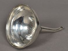 A George III silver wine funnel, hallmarked London 1790,