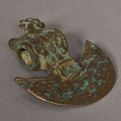 A Luristan bronze axe head With crescent blade, lion mask and applied beast. 12.5 cm wide.