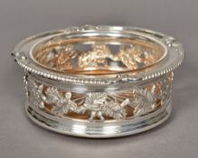 A George III silver bottle coaster, probably hallmarked Sheffield 1816,