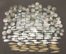 A good quantity of Chinese carved mother-of-pearl and bone game counters Various shapes and sizes,