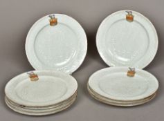 A set of nine 19th century armorial decorated porcelain plates Each of dished circular form with