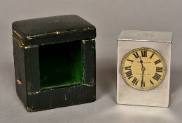 A French miniature silver carriage clock The top with an engraved cartouche above the gilt dial