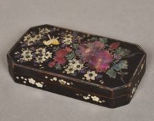 A mother-of-pearl inset lacquered box Of canted rectangular form,