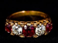 An 18 ct gold diamond and ruby five stone ring Set with three rubies interspersed with two diamonds,