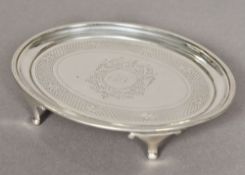 A George III silver teapot stand, hallmarked London 1797,