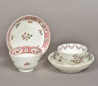 Two 18th century English porcelain tea bowls and saucers Both with typical floral decoration.