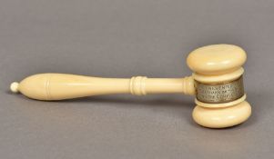 An early 20th century turned ivory gavel With white metal mount inscribed Presented to J W Davis