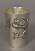 A Chinese white metal beaker, maker's mark of Tuck Chang Of tapering form,
