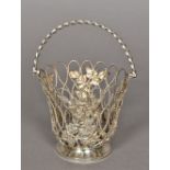 An Edward VII pierced silver basket, hallmarked Birmingham 1903, maker's mark of Elkington & Co.