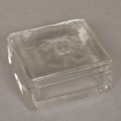 A Lalique clear glass dressing table box and cover Of rectangular section,