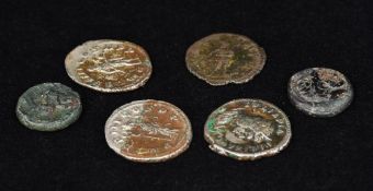 A small collection of antiquity coins Various dates and sizes.