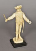 A 19th century Dieppe carved ivory cavalier Modelled wearing a feathered hat with sword drawn,