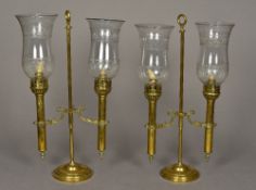 A pair of Victorian brass adjustable can