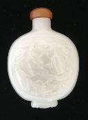 A Chinese carved jade snuff bottle and s