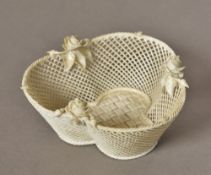 A Belleek porcelain basket Of heart sha