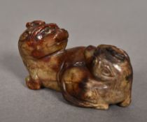 A Chinese carved russet jade animalier g