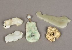 A Chinese carved jade pendant Worked wi