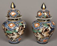A pair of Japanese porcelain vases and c