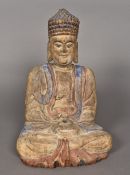 A Chinese Tang style carved wood Buddha