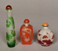 Three Chinese Peking glass snuff bottles