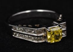 An 18 ct white gold, yellow and white di