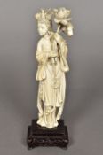 A 19th century carved ivory figure of Gu