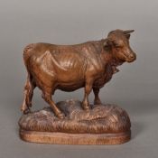 A Blackforest carved cow Modelled weari