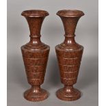 A pair of 19th century carved red marble