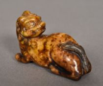 A Chinese carved russet jade dog-of-fo,