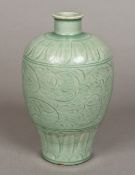 A Chinese porcelain vase With incised d